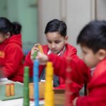 Children developing communication skills in the classroom