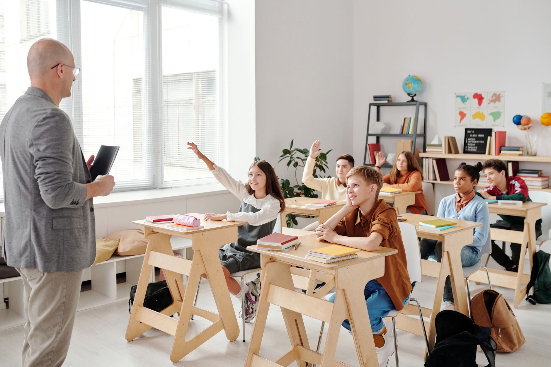 Teacher leading a classroom discussion